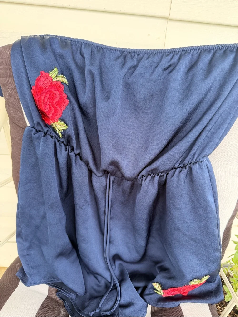 Everly Navy Romper with Rose Embellishment